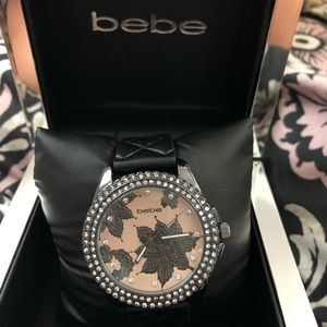 Bebe Black and Pink Rhinestone Floral Watc…